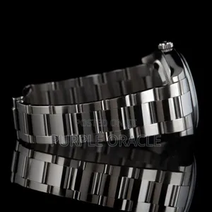 Rolex Oyster Perpetual Men's Steel Dome Bezel Watch Grey Dial.