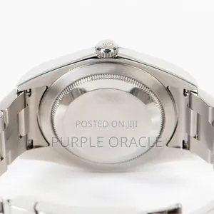 Rolex Oyster Perpetual Men's Steel Dome Bezel Watch Grey Dial.