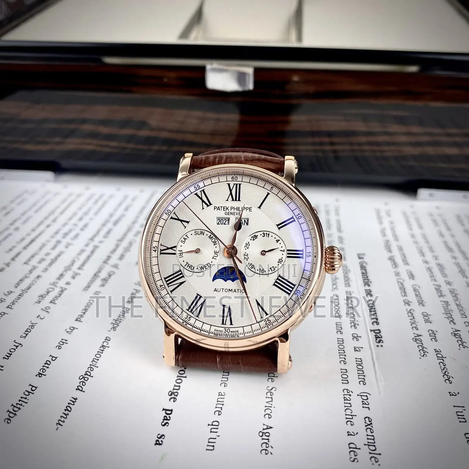 Patek Philippe Watch With a Brown Leather Strap and Rose Gold Case