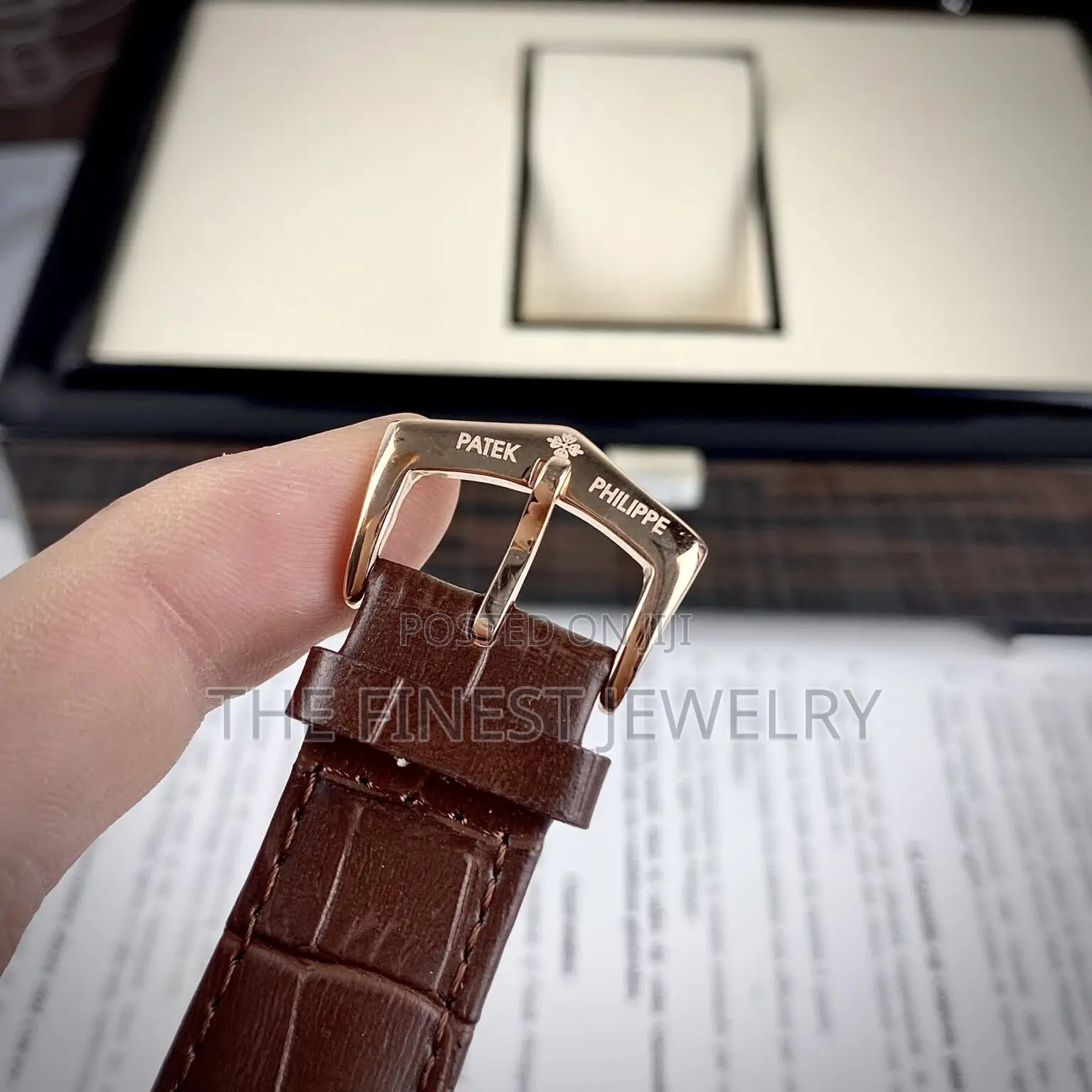 Patek Philippe Watch With a Brown Leather Strap and Rose Gold Case