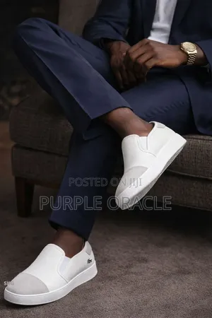 Lacoste Men's White Slip-on Sneakers.
