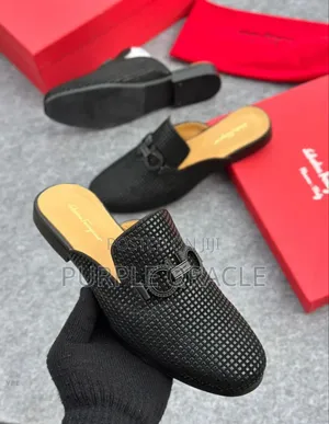 Salvatore Ferragamo Black Leather Half Shoes .