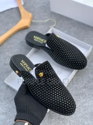 Versace Backless Loafers for Men.