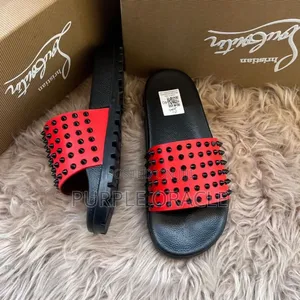 Christian Louboutin Quick-Dry Outdoor Rubber Slides.