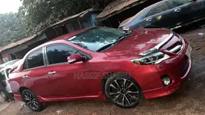 Toyota Corolla L 4dr Sedan (1.8L 4cyl 5M) 2013 Red