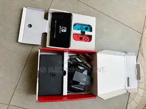 Neat Nintendo Switch With All Accessories and Games Installed