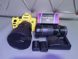 Sony A7s, 2 Lens, 3 Batteries, a Charger and a Lens Adaptor
