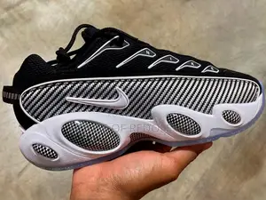 Drake’S Nike Nocta Glide Black/White Sneakers