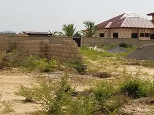 Own a Spacious Land 70x100ft at Orange Villa, Prampram
