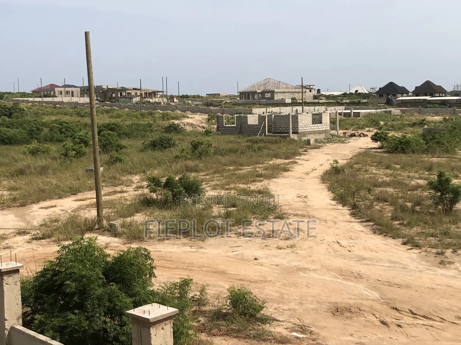 Own a Spacious Land 70x100ft at Orange Villa, Prampram