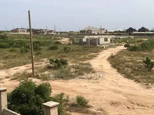 Own a Spacious Land 70x100ft at Orange Villa, Prampram