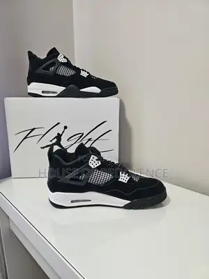 Air Jordan 4 Retro White Thunder Sneakers