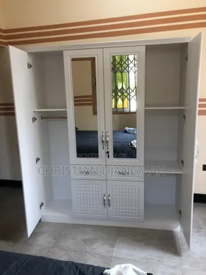 Ultra Modern Four Door Foreign Wardrobe.
