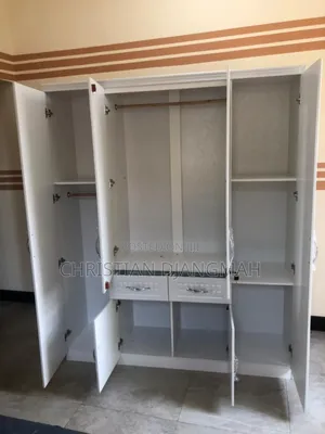 Ultra Modern Four Door Foreign Wardrobe.