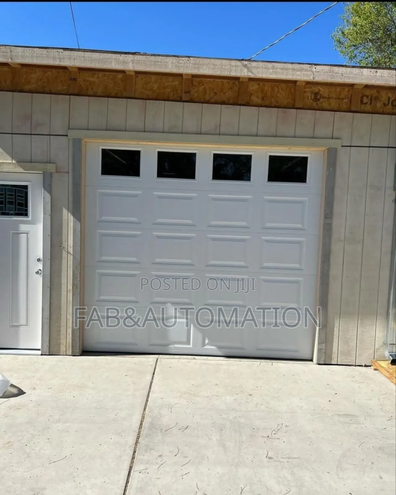 Garage Doors With Fanlight and Motor
