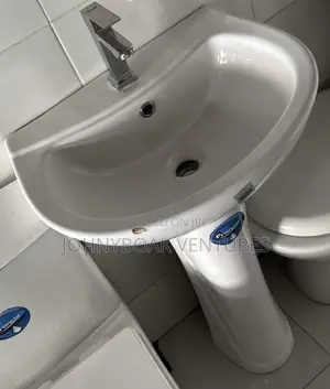 Basin and Stand With Tap
