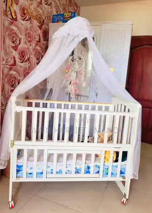 Baby Wooden Cot With Free Spiral Cot Bumper and Free Mosquito Net.