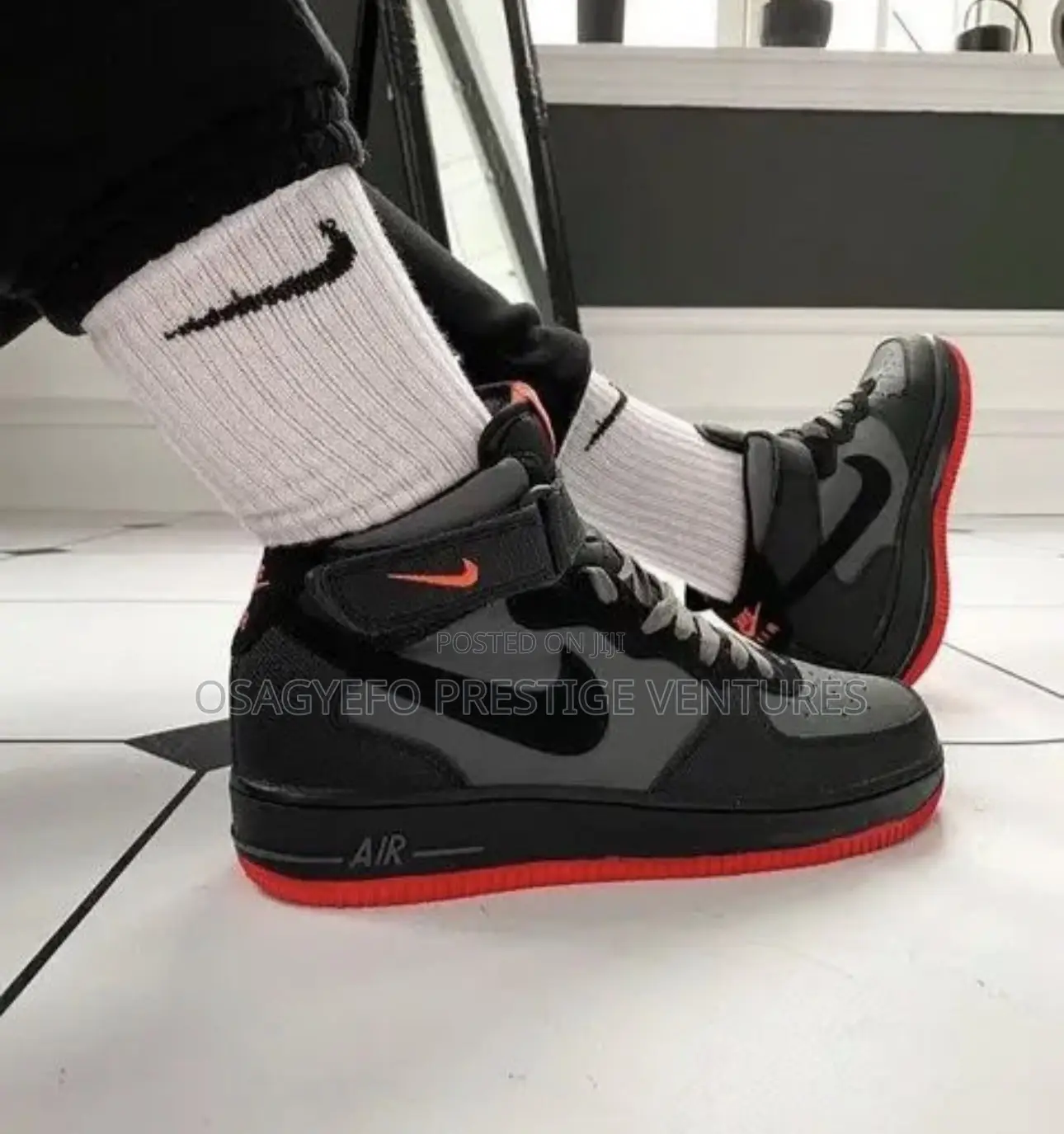 Black Nike Air Force 1 Mid.