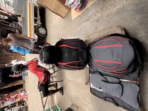 Two Front Leather Seat Covers With Black and Red Design