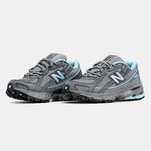 New Balance 740 in a Grey and Light Blue Sneakers