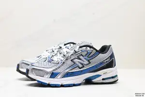 New Balance 740 in White Blue Colorway Sneakers