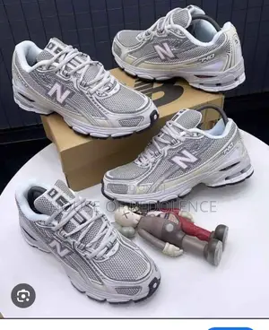 New Balance 740 in Metallic Silver Colorway Sneakers