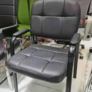 Conference Chair Features a Black Leather Seat With Fixed Armrest.