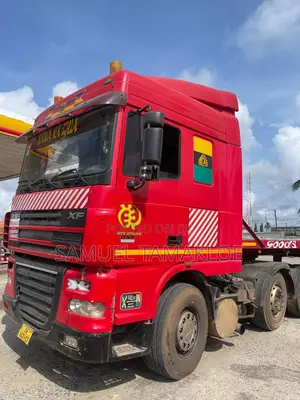 Daf Xf Single Axle With Helper. Trailer Inclusive