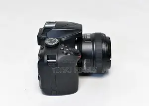 Nikon D3400 (Low Shutter Count) + Yongnuo 35mm F/2 Prime Lens