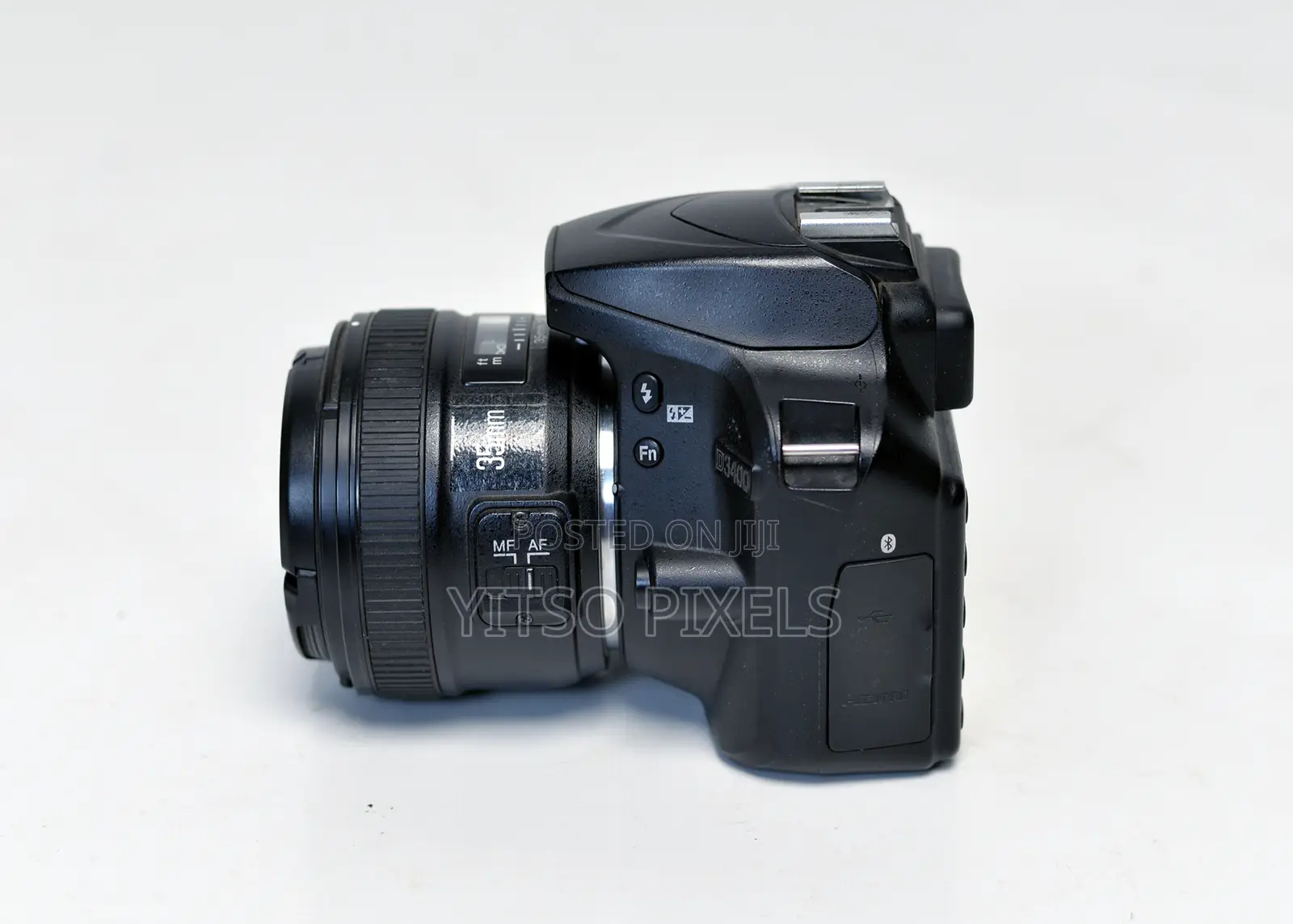 Nikon D3400 (Low Shutter Count) + Yongnuo 35mm F/2 Prime Lens