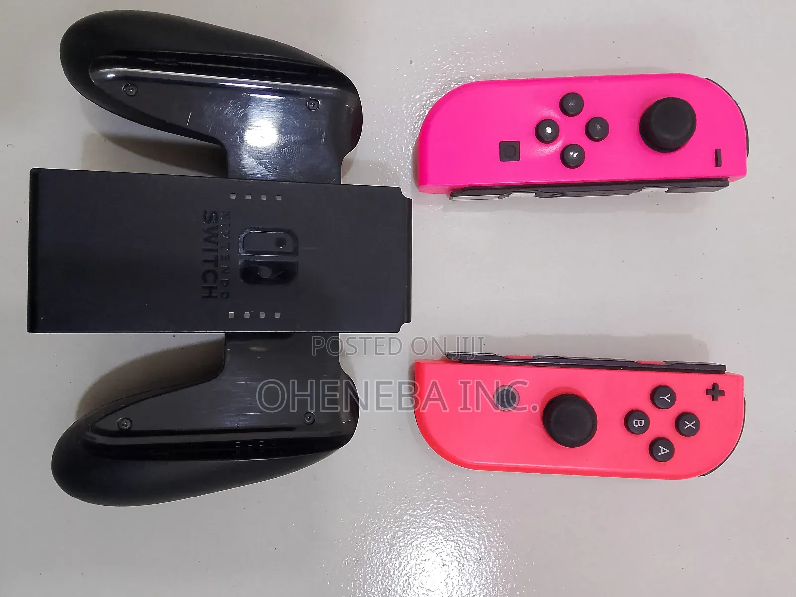 Nintendo Switch Joy-Cons + Holder