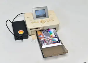 Canon Selphy Cp1000 Compact Photo Printer + External Power Pack