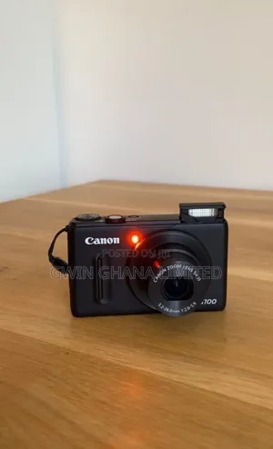Canon Powershot S100 Clear Videos/Pictures. Battery Charger, Sd Card