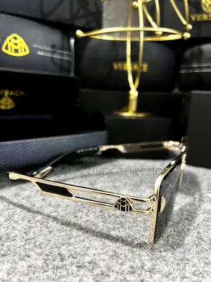Gold Detail, Tinted Perfection — Sunglasses for Men.