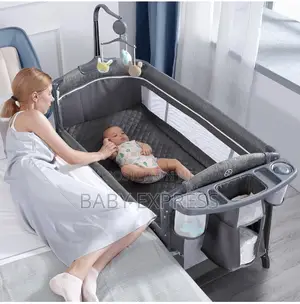 Foldable 4-in-1 Baby Playpen Bed With Changing Mat Rotating Rattles