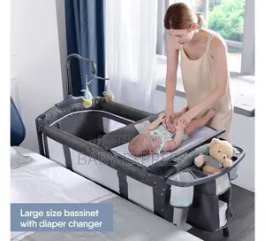 Foldable 4-in-1 Baby Playpen Bed With Changing Mat Rotating Rattles
