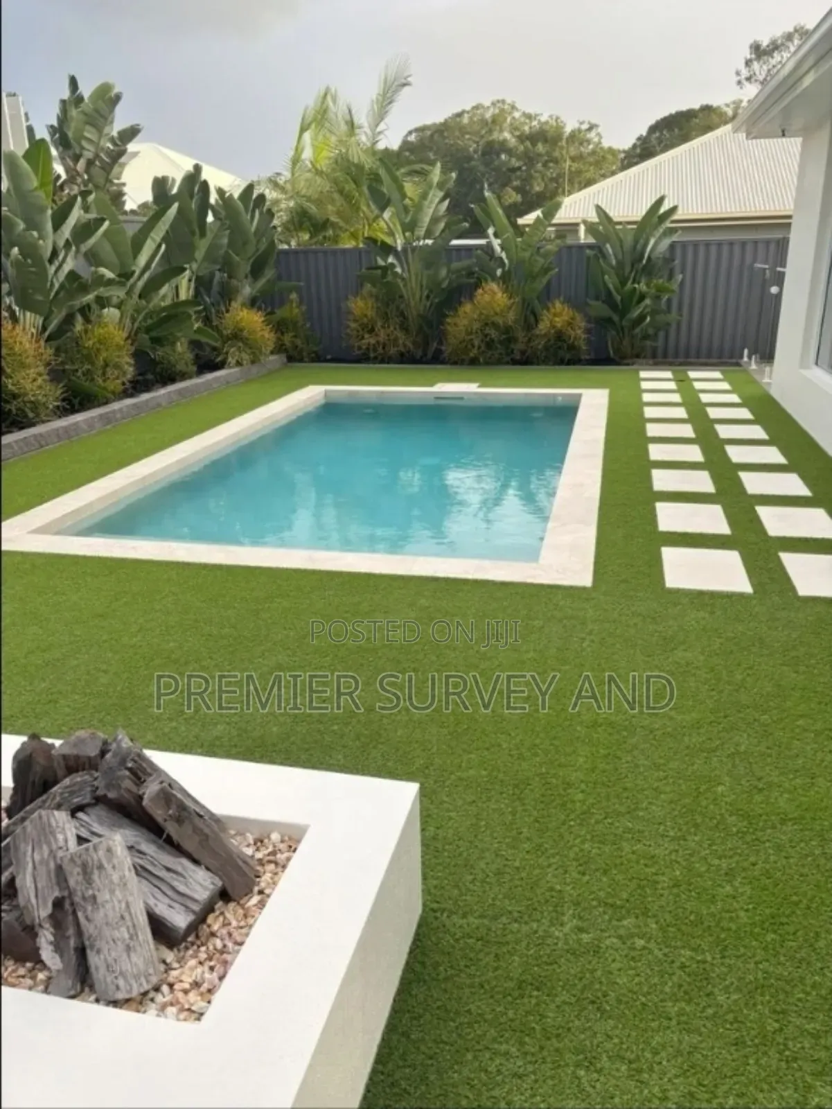 Modern Backyard With Private Pool and Stylish Landscaping