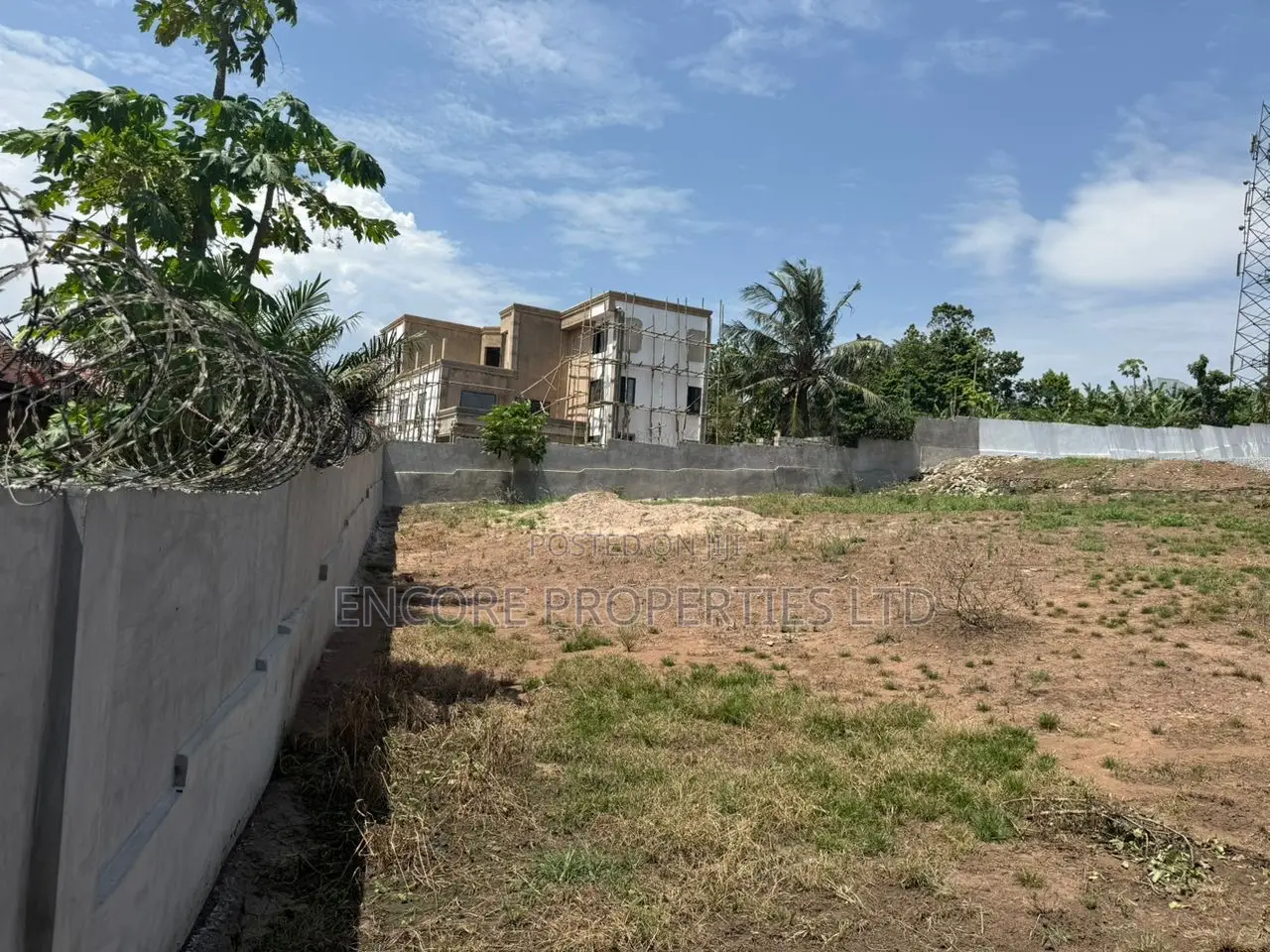 Walled and Gated 125/100sqft Land