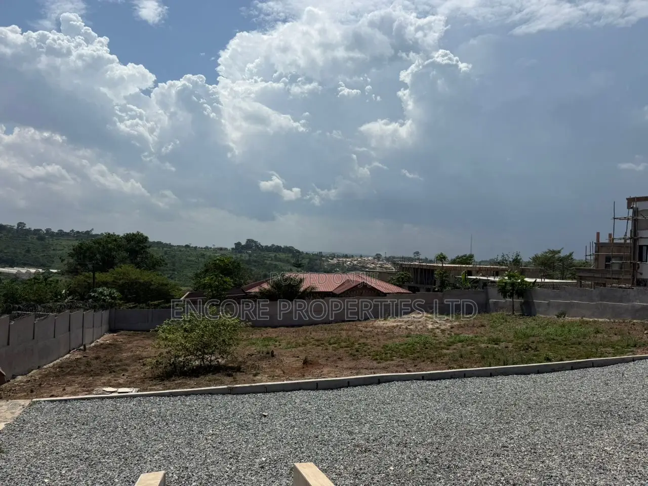 Walled and Gated 125/100sqft Land
