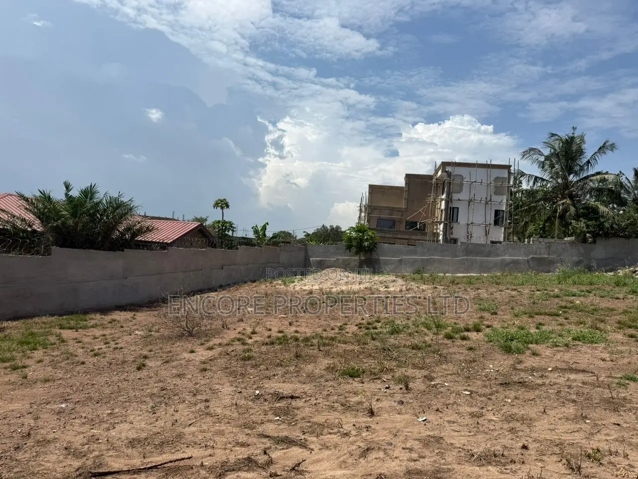 Walled and Gated 125/100sqft Land
