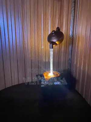 Indoor Teapot-Themed Tabletop Water Fountain Featuring Led Lighting.
