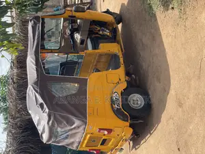 Bajaj RE 2023 Yellow