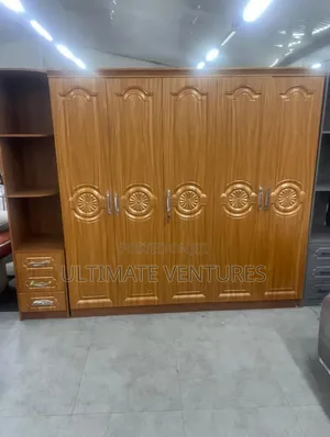 Elegant Wooden 4-Door Wardrobe With Carved Panels