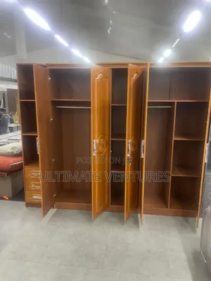 Elegant Wooden 4-Door Wardrobe With Carved Panels