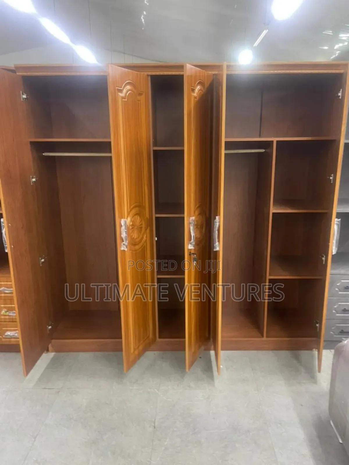 Elegant Wooden 4-Door Wardrobe With Carved Panels