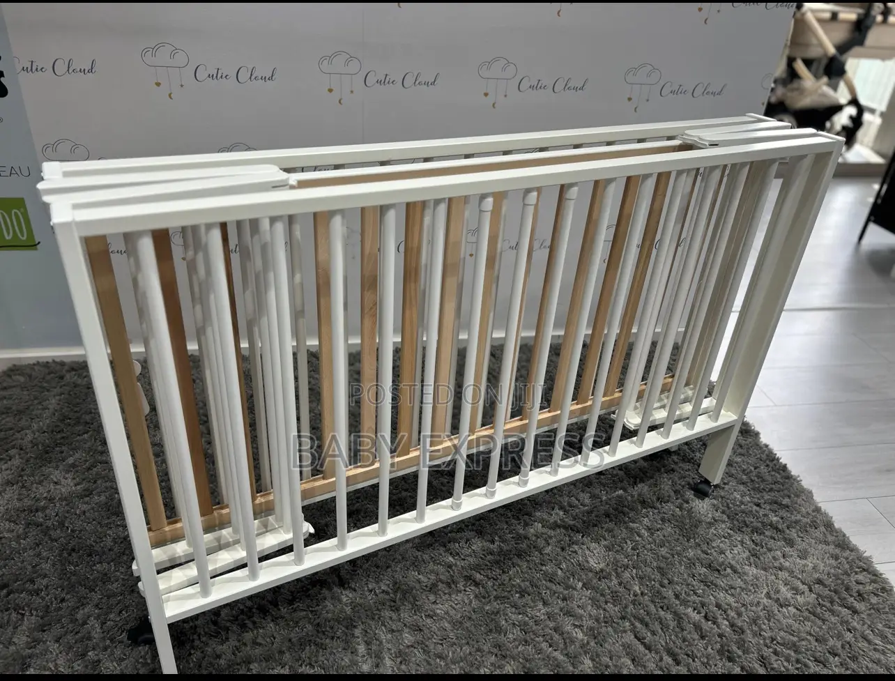Foldable Wooden Baby Cot – Portable, Durable Space-Saving Infant Bed