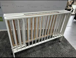Foldable Wooden Baby Cot – Portable, Durable Space-Saving Infant Bed