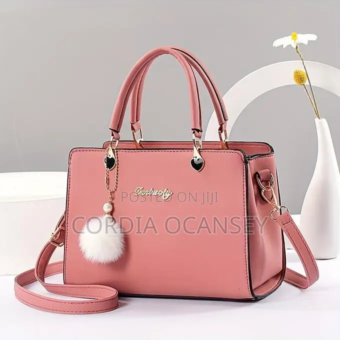 Stylish Pink Handbag With Strap Perfect for Everyday Use
