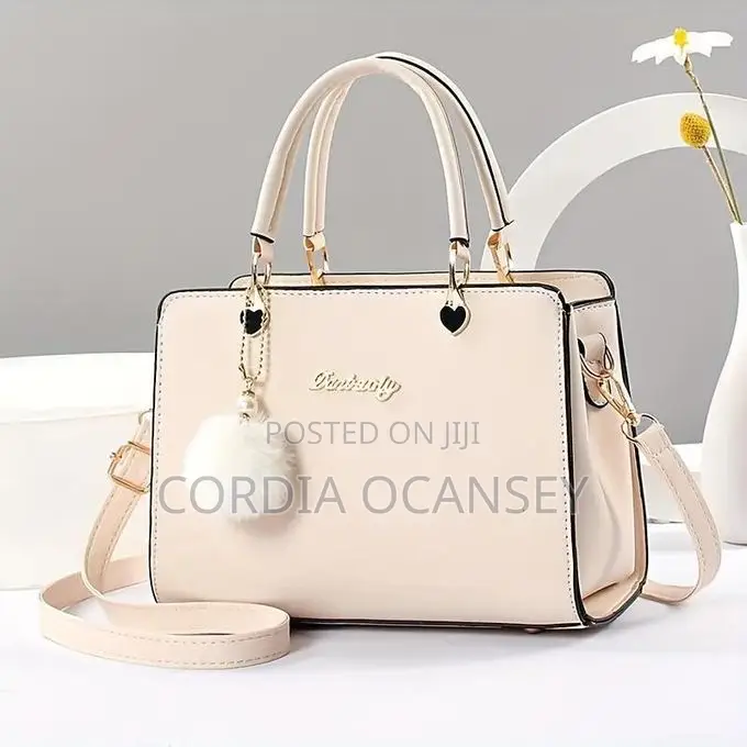 Stylish Pink Handbag With Strap Perfect for Everyday Use