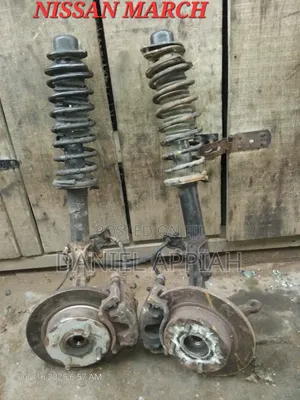 Nissan March 2000 Front Shocks and Hub